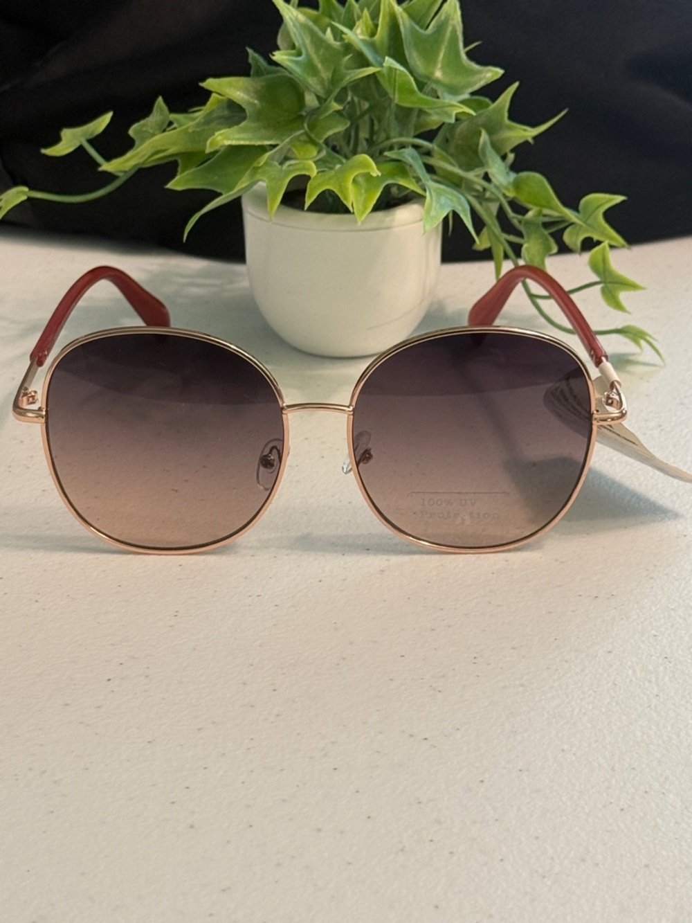 a new day Rose Gold Frame Sunglasses with Brown Gradient Lenses and Red Temples